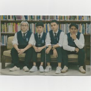The four friends are thinking in the library.